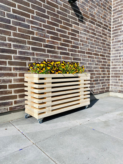 Blomsterkasse af Nye Traller
