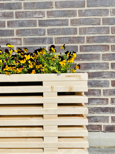 Blomsterkasse af Nye Traller